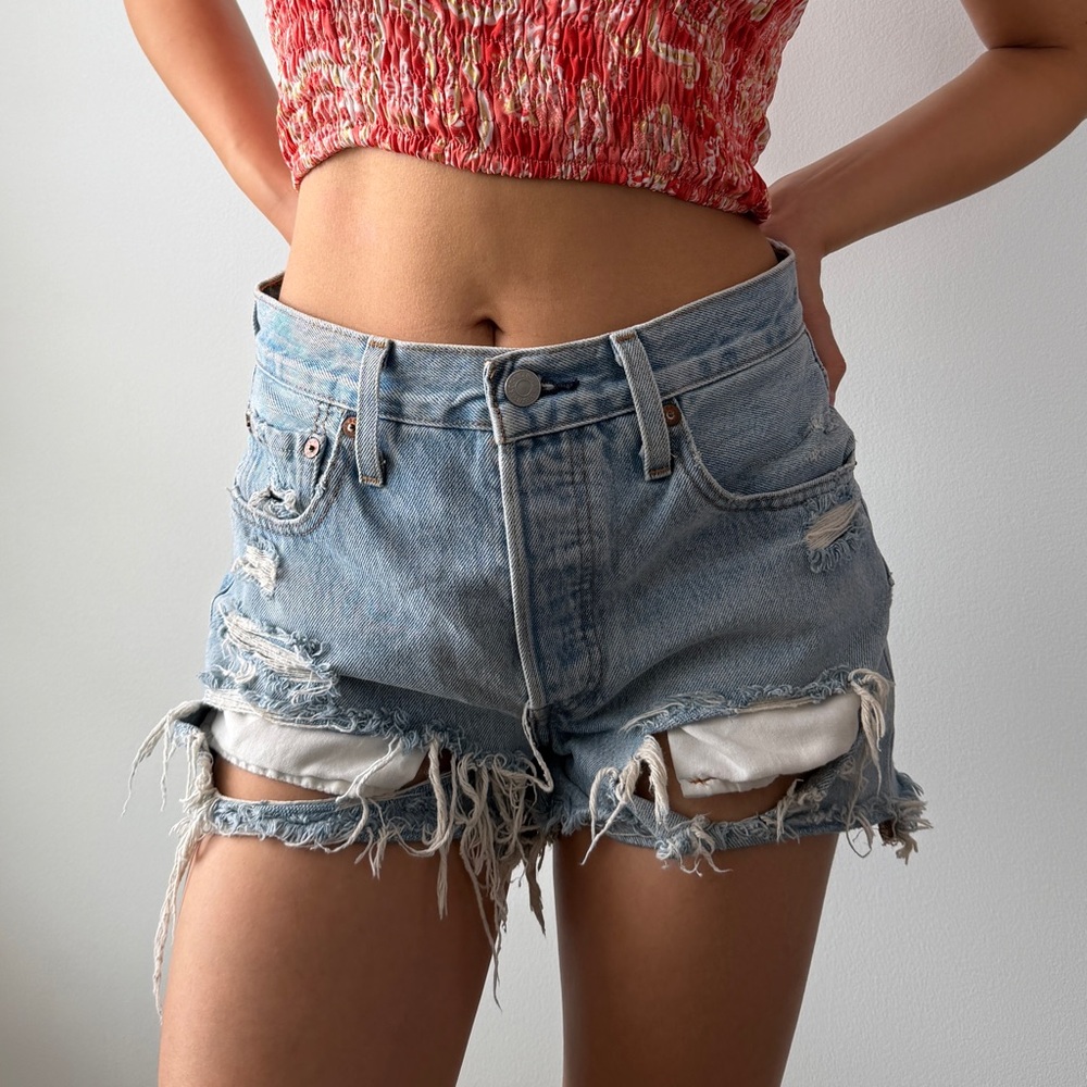 Levi’s Light Wash Distressed Denim Shorts - W24